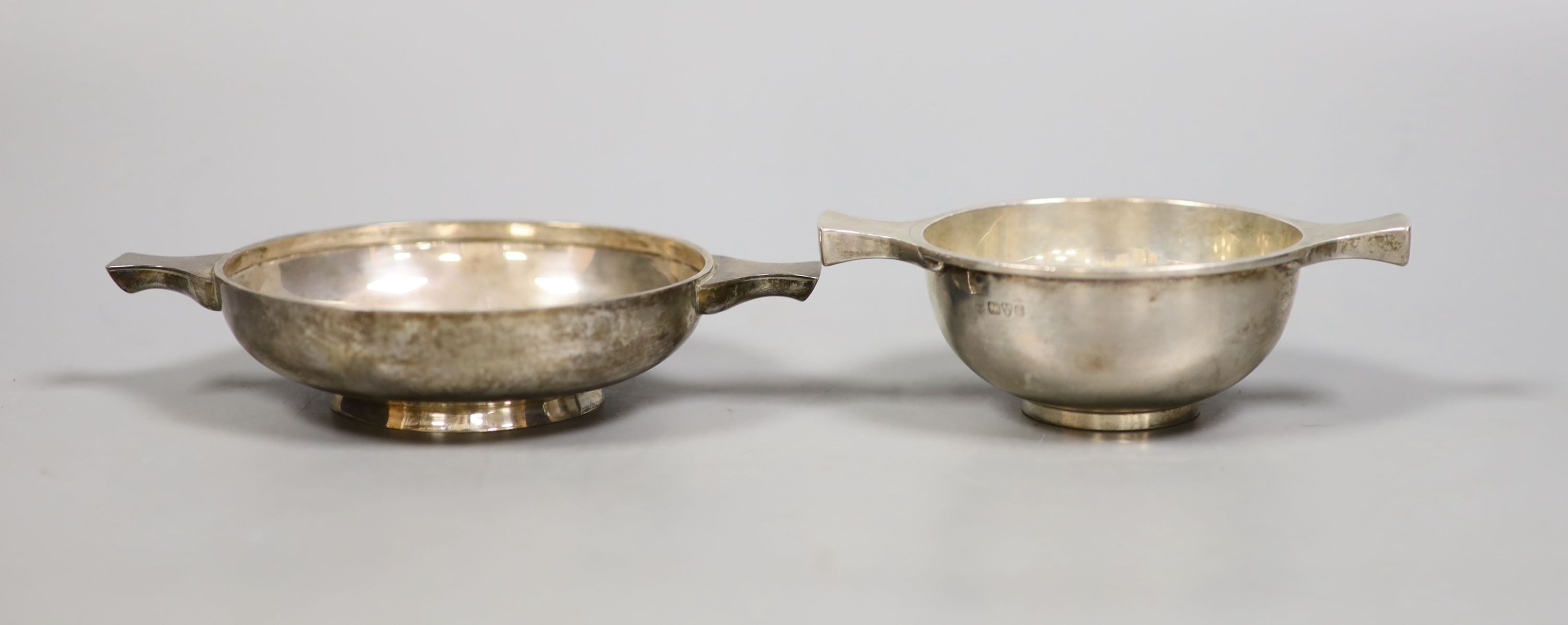 An Edwardian silver quaich, Chester, 1904, 12.1cm and a similar George V quaich, London, 1924, 6.5oz.